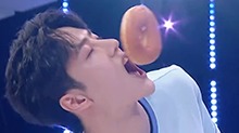 YIbo struggles to eat donut